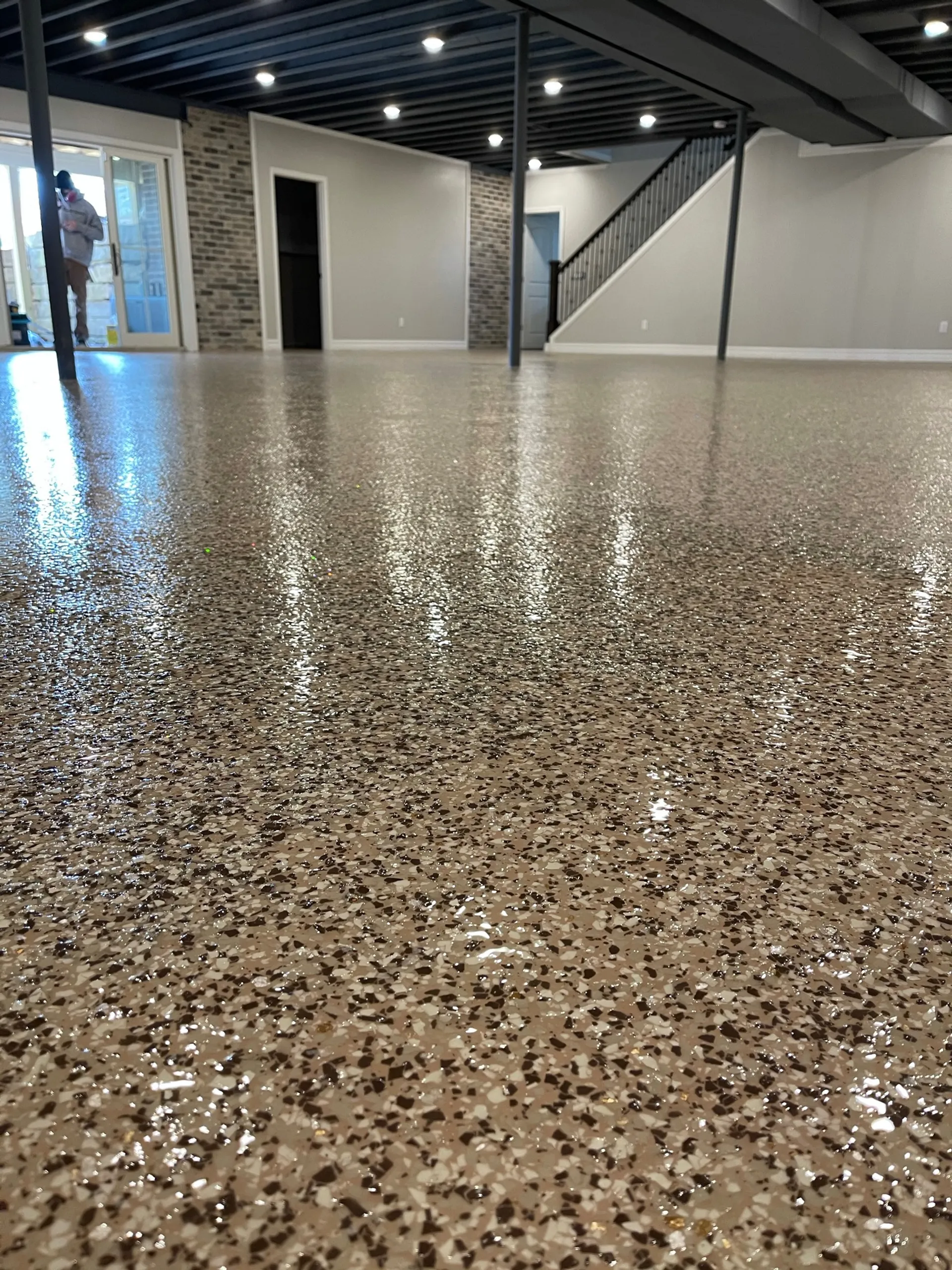 Basement epoxy floor coating — moisture-resistant system by Hardcore Epoxy Detroit